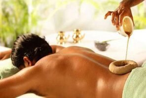 Warm medicated oil retained over the lower back or neck to relieve deep tissue stiffness