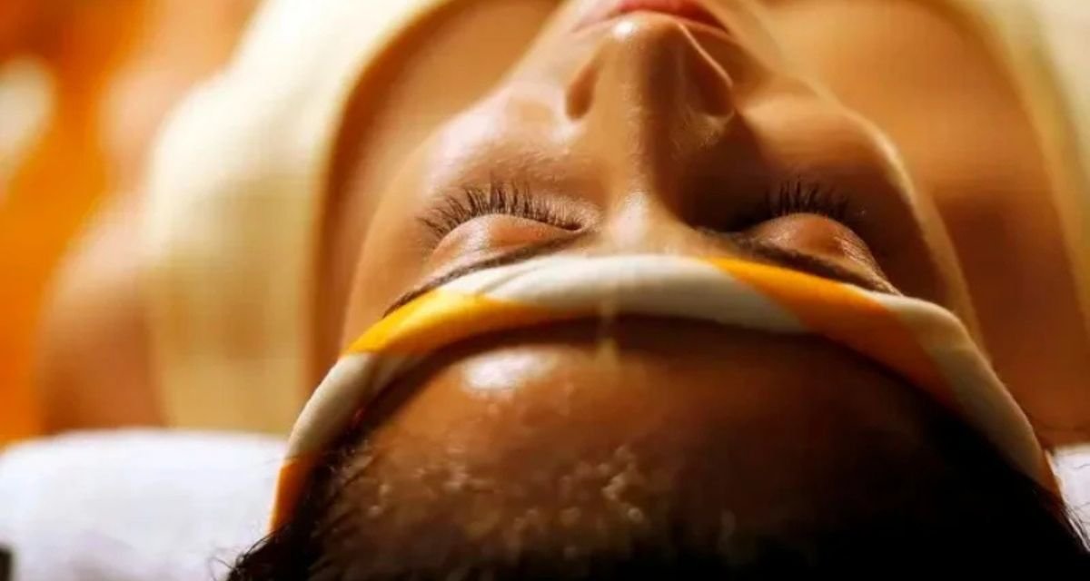 Migraine relief massage using warm herbal oils to relax the head, neck, and shoulders
